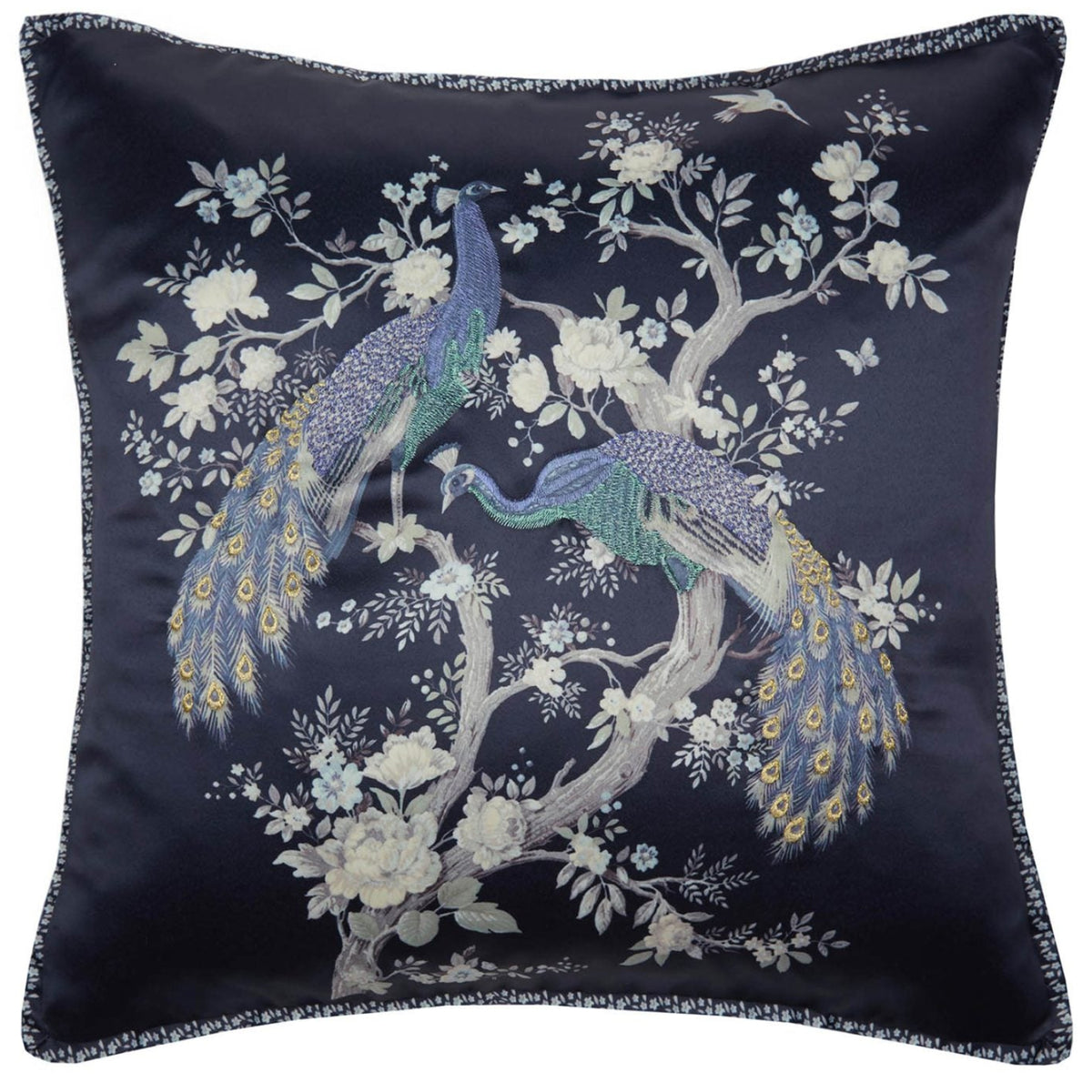 Navy blue decorative cushion with a floral pattern and two peacocks.