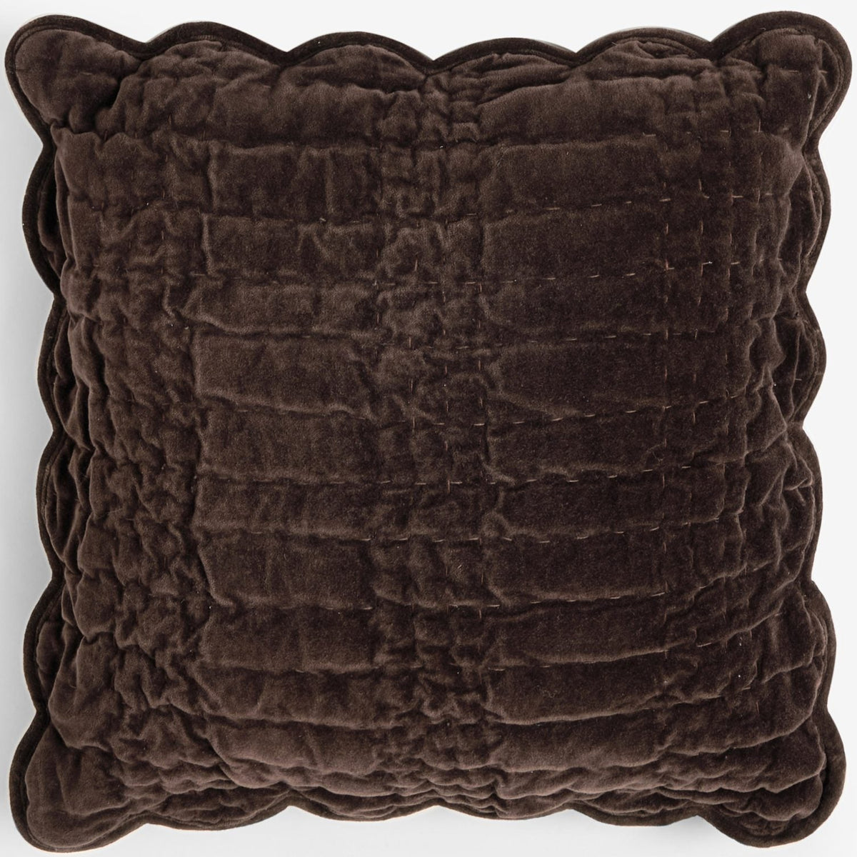 Dark brown velvet quilted cushion with decorative scalloped edges