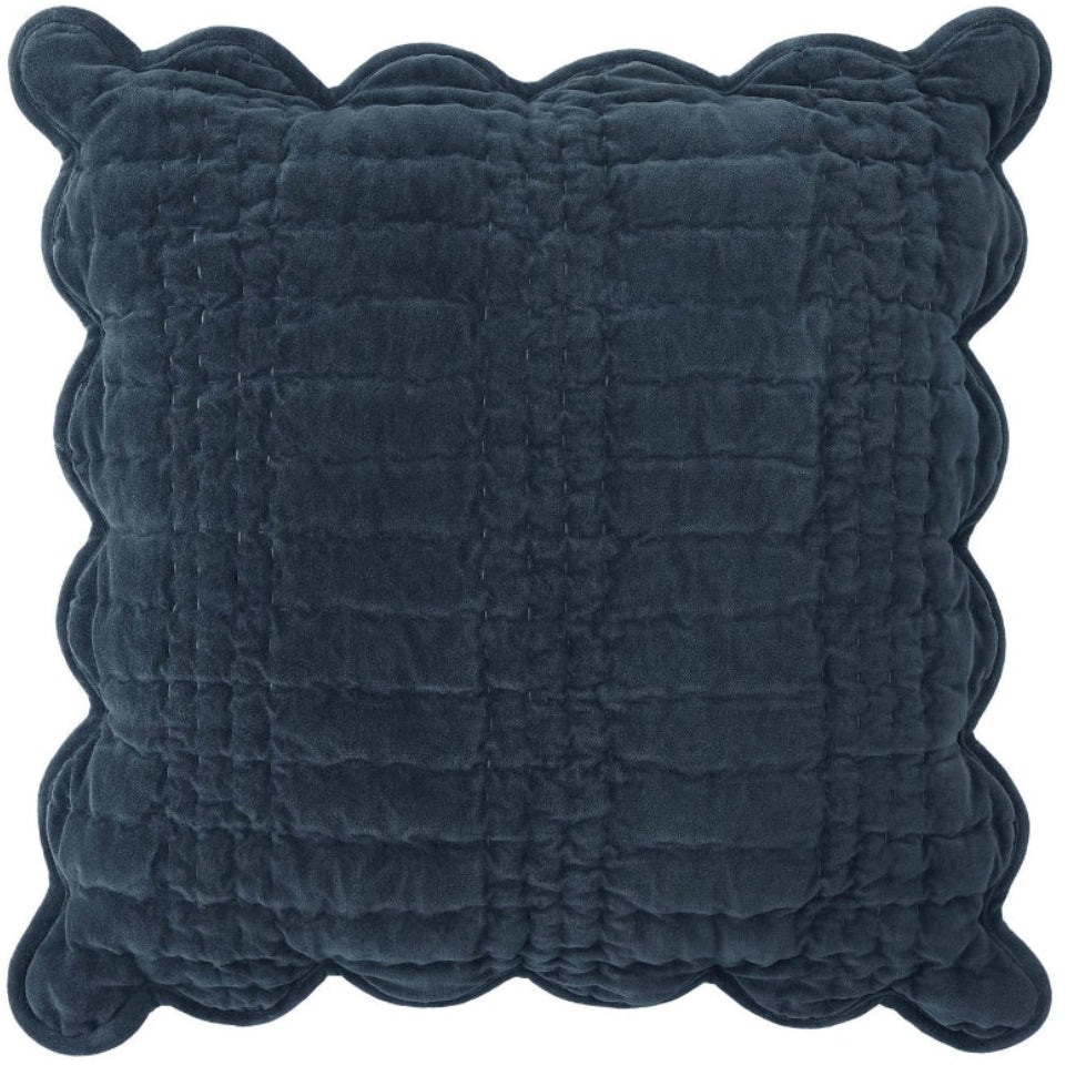 Navy blue quilted decorative cushion with scalloped edges