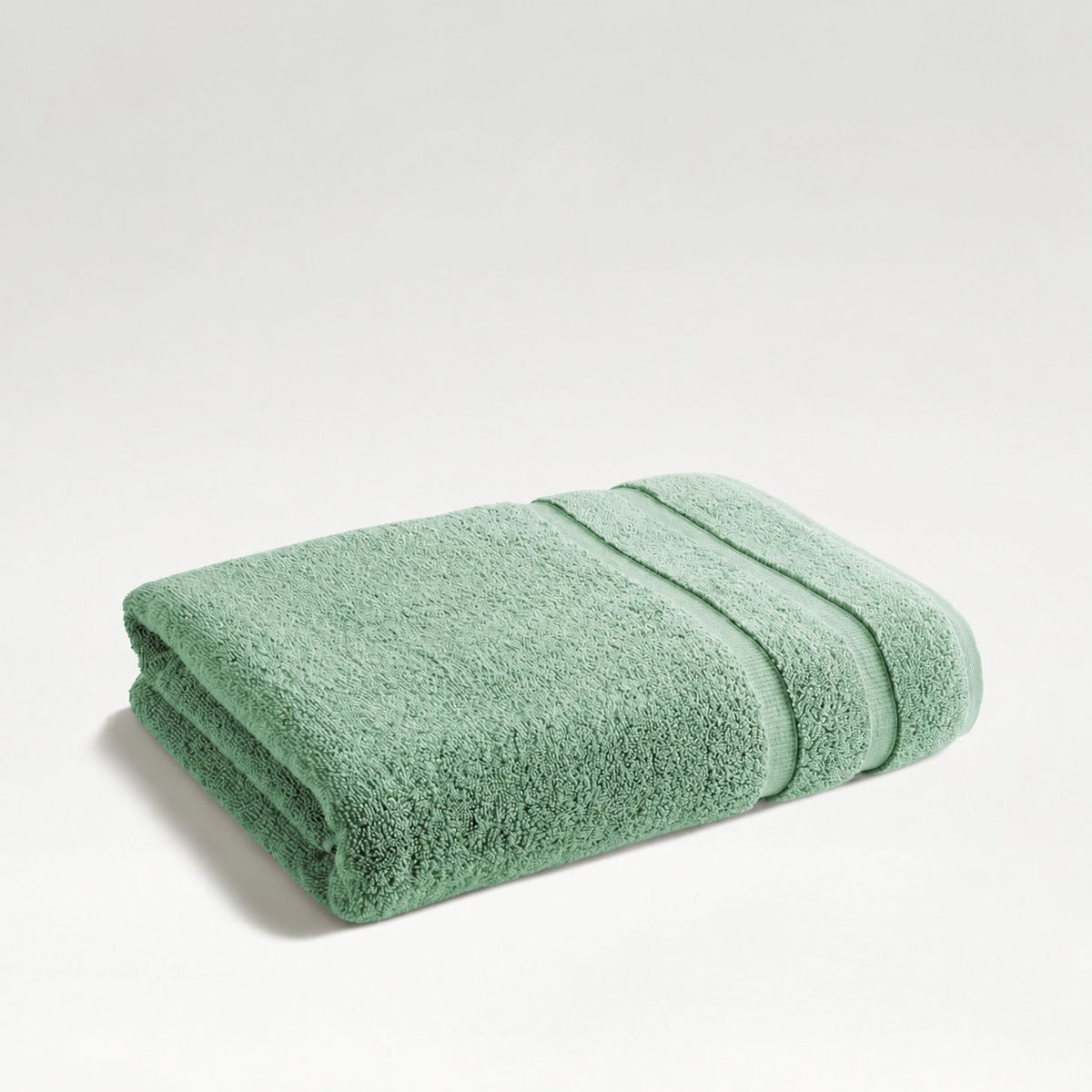 Christy Signum Jade folded towel with two woven border bands