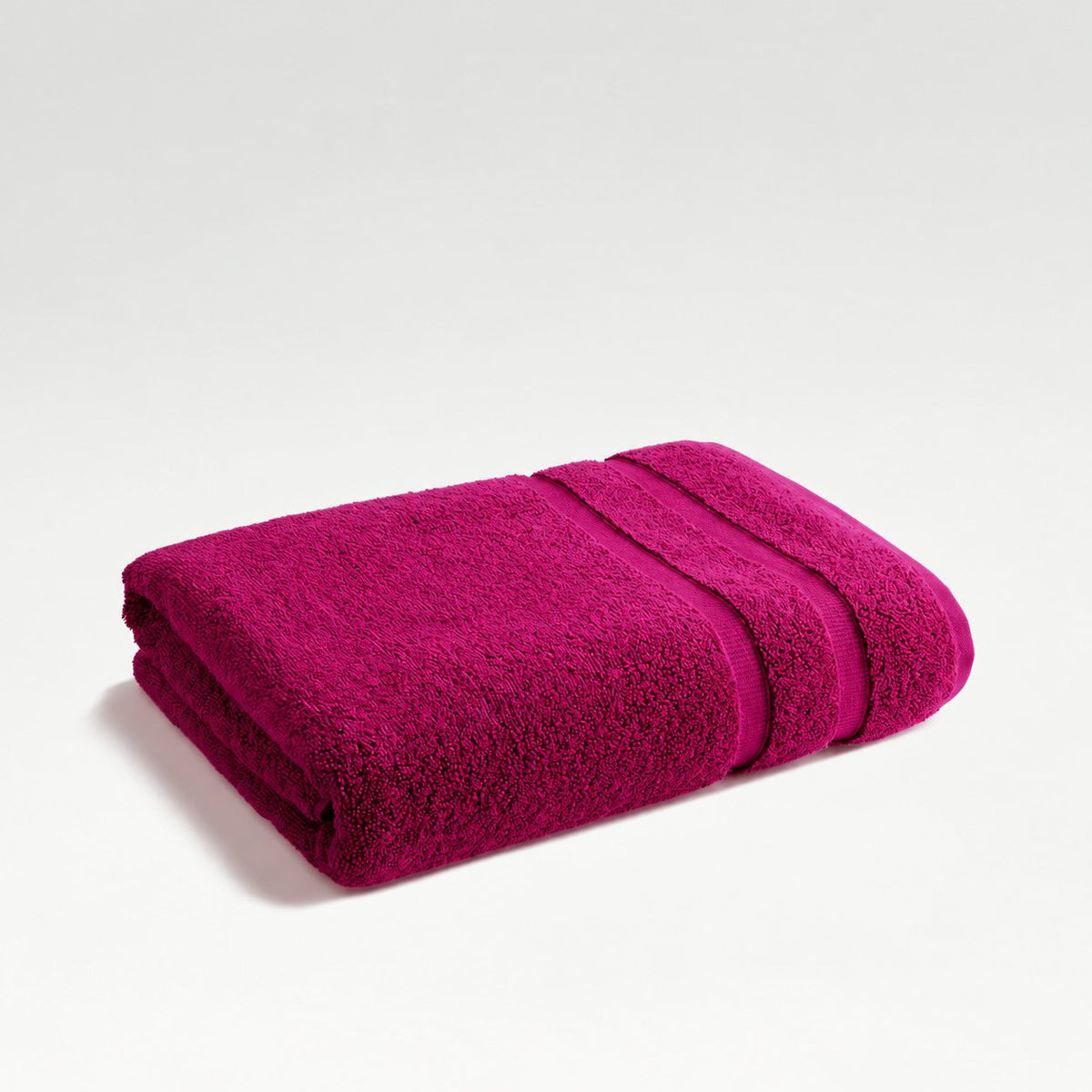 Christy Signum Plum folded towel with two woven border bands