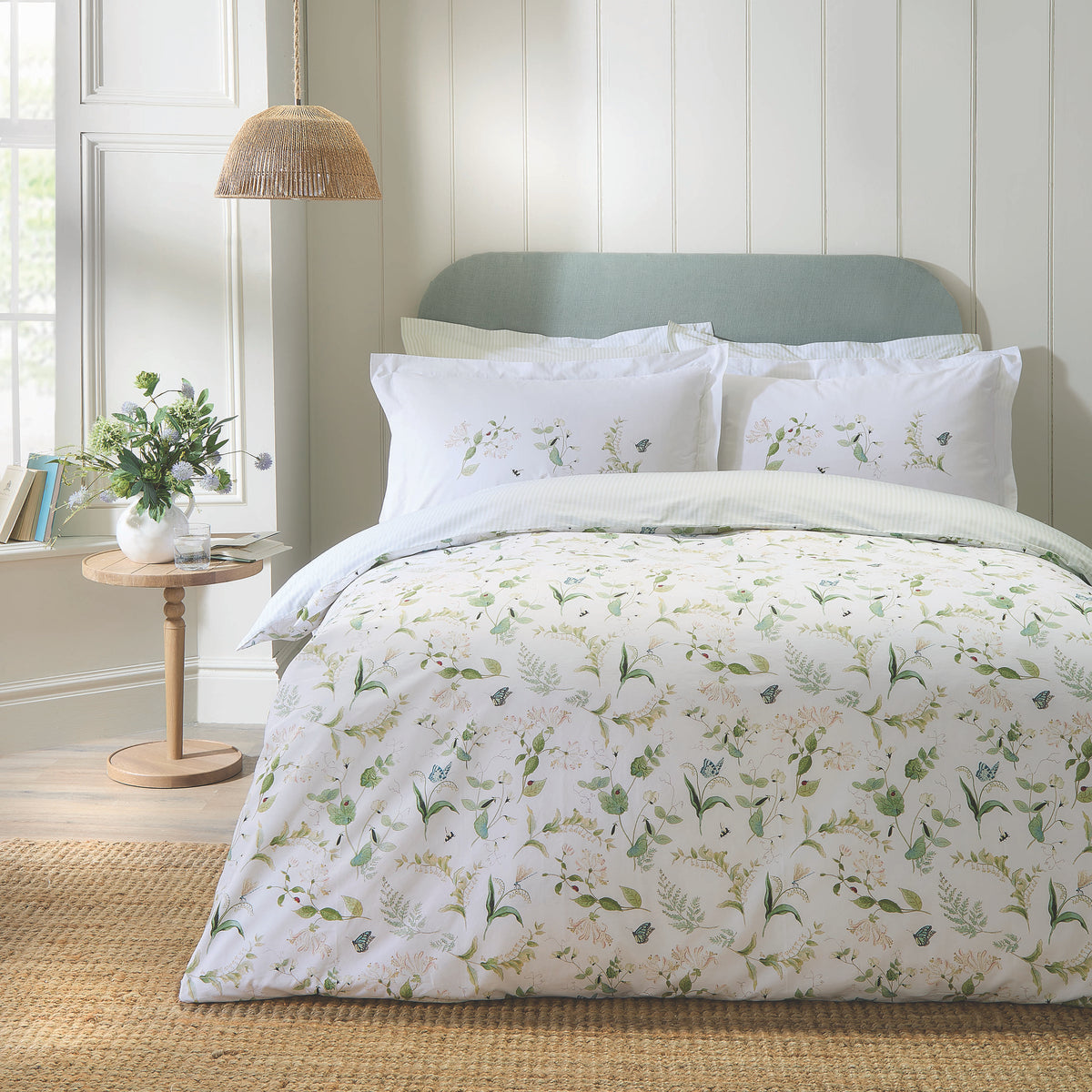 Sophie Allport floral bedding styled in a light, welcoming bedroom