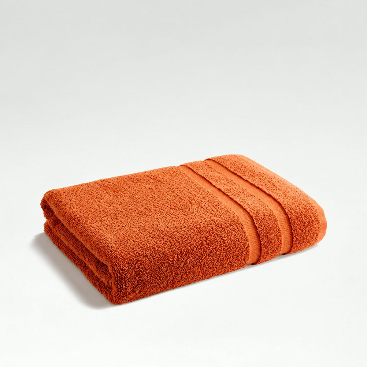 Christy Signum Amber folded towel with two woven border bands