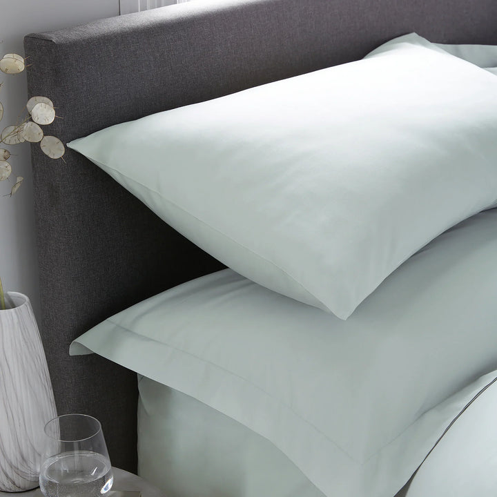 Serene Plain Dyed Pair of Housewife Pillowcases - Green - Williamsons Factory Shop